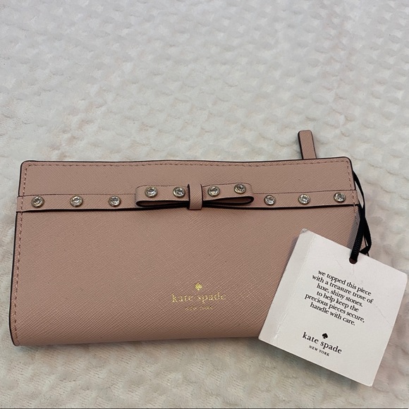 kate spade Handbags - Kate Spade Laurel Way Jeweled Stacy Bow Wallet